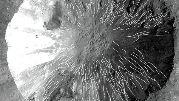 Прямые и извилистые овраги в кратере Корнелия на Весте (обозначены белыми линиями), снимок зонда Dawn