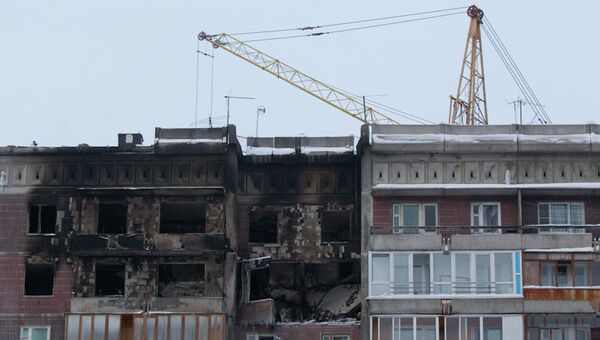 Восстановительные работы в доме, пострадавшем от взрыва, в Томске