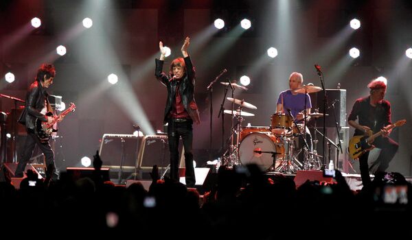Группа Rolling Stone на благотворительном рок-концерте 12-12-12 в нью-йоркском зале Madison Square Garden
