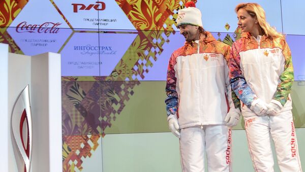 Илья Авербух и Татьяна Навка во время церемонии презентации Олимпийского факела