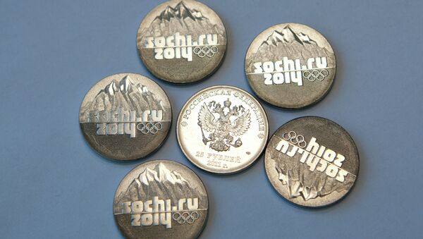 Монеты, посвященные Олимпийским играм в Сочи 2014 года, архивное фото