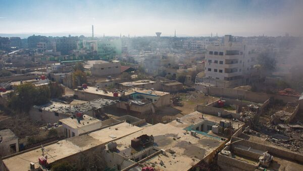 Вид на территорию, занятую боевиками Свободной армии Сирии, в городе Дарайя. Архив
