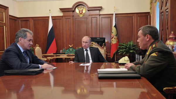 Президент России Владимир Путин, министр обороны Сергей Шойгу и начальник Генерального штаба Вооруженных Сил РФ Валерий Герасимов