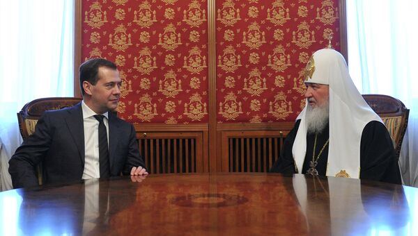Председатель правительства России Дмитрий Медведев и патриарх Московский и Всея Руси Кирилл