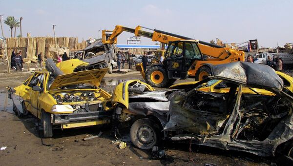 Последствия взрыва на рынке в Багдаде