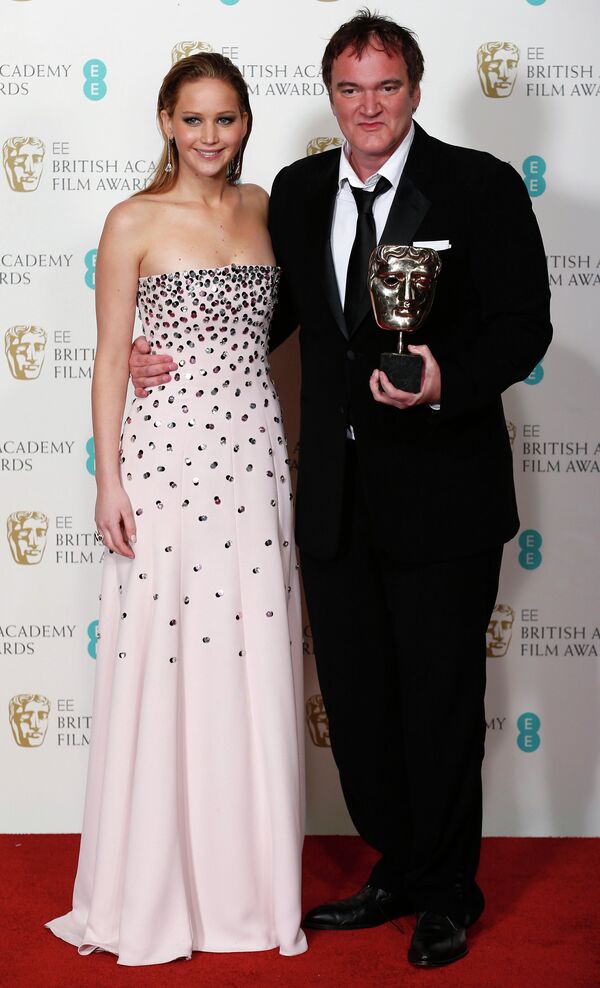 Режиссер и сценарист Квентин Тарантино и актриса Дженнифер Лоуренс на церемонии вручения премии BAFTA