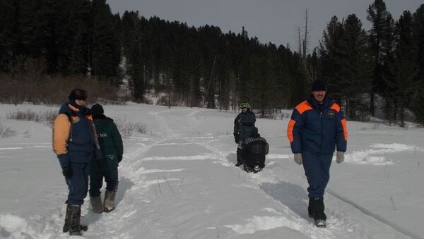 Поиски туристов, застрявших на снегоходах в горах Алтая