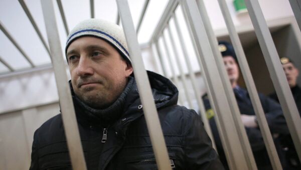 Александр Марголин, обвиняемый в участии в массовых беспорядках на Болотной площади 6 мая 2012 года, в Басманном суде Москвы.