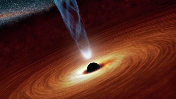 Сверхмассивная черная дыра в центре одной из галактик в представлении художника