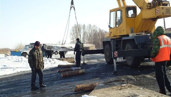 Крупнейшая ледовая переправа в Кузбассе закрыта из-за паводка