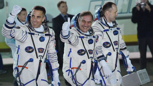 Астронавт НАСА Кристофер Кэссиди и космонавты Роскосмоса Павел Виноградов и Александр Мисуркин, архивное фото