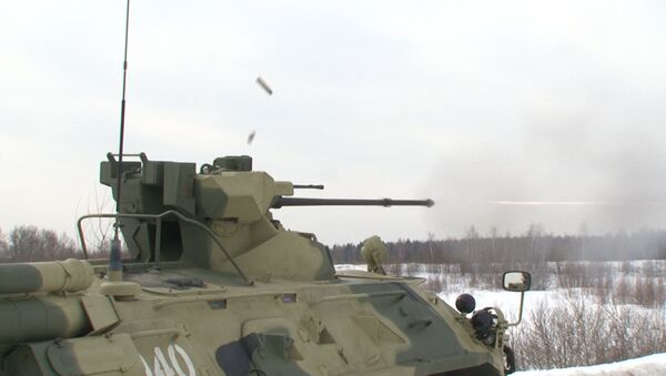 Военные на новом БТР-82А поражают мишени и готовятся к параду Победы