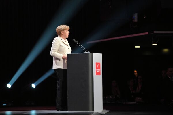 Канцлер ФРГ Ангела Меркель выступает на торжественном открытии Ганноверской промышленной ярмарки