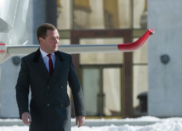 Председатель правительства РФ Дмитрий Медведев на вертолетной площадке перед Домом правительства