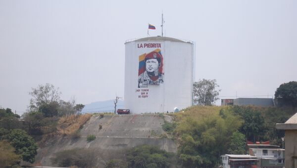 Изображение Уго Чавеса в Каракасе