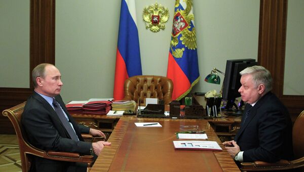 Президент России Владимир Путин и глава Федеральной миграционной службы Константин Ромодановский