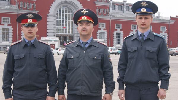 Полицейские Алексей Едрешов, Александр Самсоненко и Дмитрий Коновалов