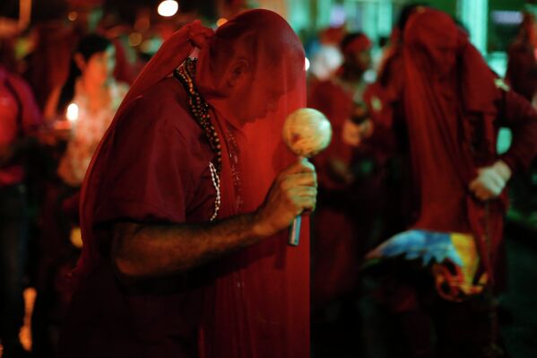 Участник “Танцев дьяволов” во время праздника Тела и Крови Христовых в Венесуэле