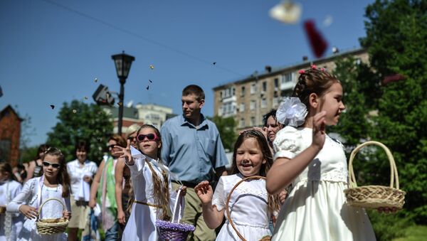 Шествие католиков в праздник Торжества Тела и Крови Христовых