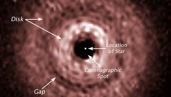 Протопланетный диск TW Гидры “глазами” телескопа Хаббл