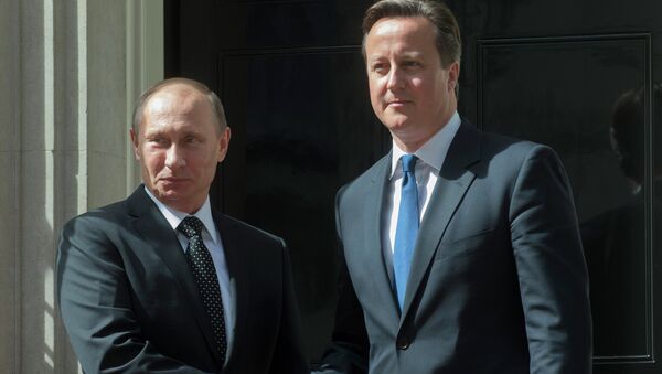 Президент России Владимир Путин и премьер-министр Великобритании Дэвид Кэмерон, архивное фото