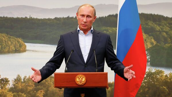 Президент России Владимир Путин выступает в рамках саммита G8