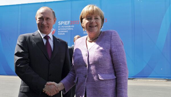 Президент России Владимир Путин b канцлер Германии Ангела Меркель. Архивное фото