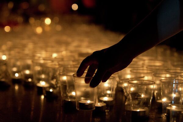 Томичи зажгли свечи в День памяти и скорби