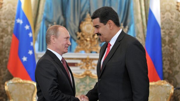 Президент России Владимир Путин и президент Боливарианской Республики Венесуэла Николас Мадуро во время встречи в Большом Кремлевском дворце