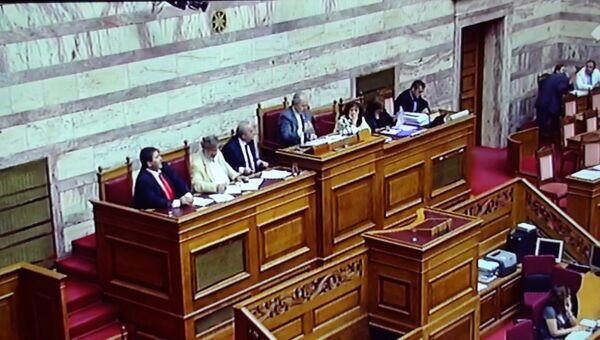 Парламент Греции Парламент Греции принял законы для получения кредита на 6,8 млрд евро