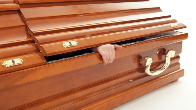 Живой в гробу