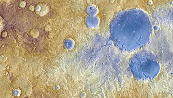 Русла рек на Марсе, возможно, появились в результате таяния снега на склонах гор
