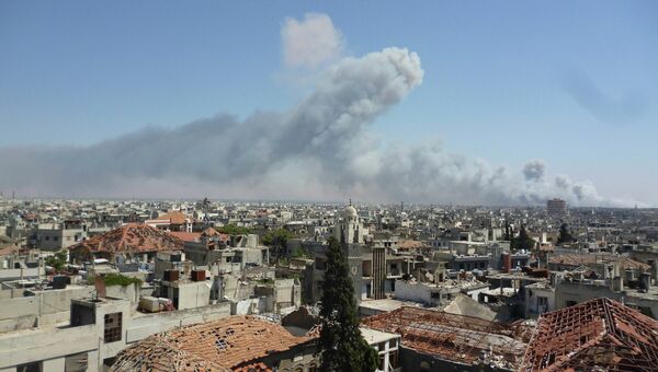 Дым над городом Хомс, Сирия
