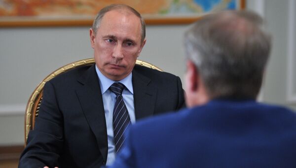 Президент России Владимир Путин (слева) и глава Сбербанка Герман Греф. Архивное фото