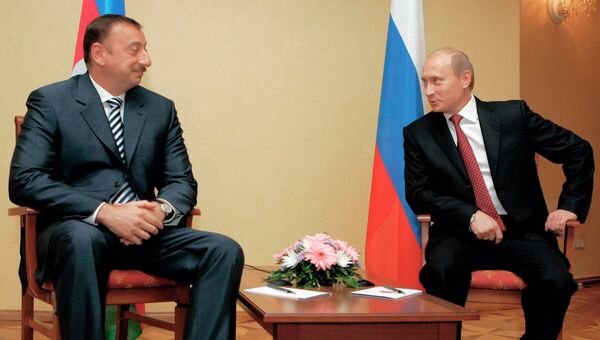 Президент Азербайджана Ильхам Алиев и президент России Владимир Путин во время встречи в государственной резиденции «Алмалы», 2006