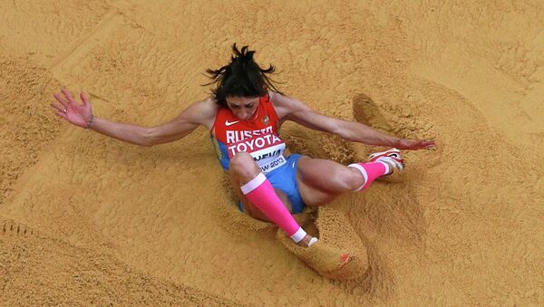 Россиянка Екатерина Конева в финальных соревнованиях по тройному прыжку среди женщин на чемпионате мира по легкой атлетике