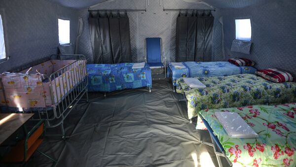 Палатка в лагере для проживания семей, пострадавших от паводка, в поселке Троицкое Хабаровского края. Архивное фото