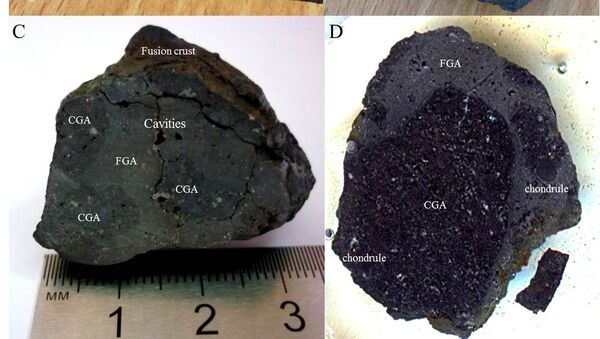 Фрагмент челябинского метеорита, на котором видна кора плавления