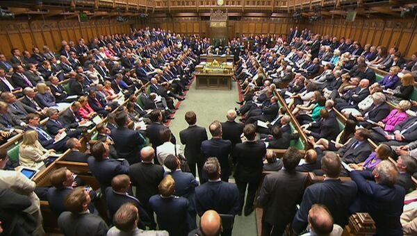 Члены британского парламента во время заседания в Палате общин на тему сирийского кризиса