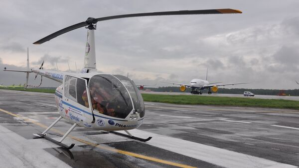 Вертолет Robinson R-66 с членами экспедиции «Россия 360»