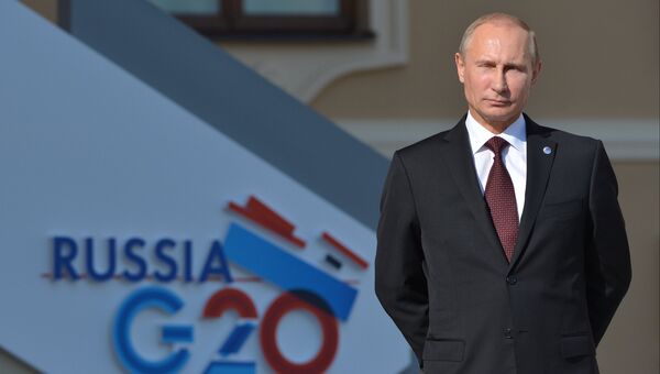 Президент России Владимир Путин на официальной церемонии встречи глав делегаций государств-участников Группы двадцати