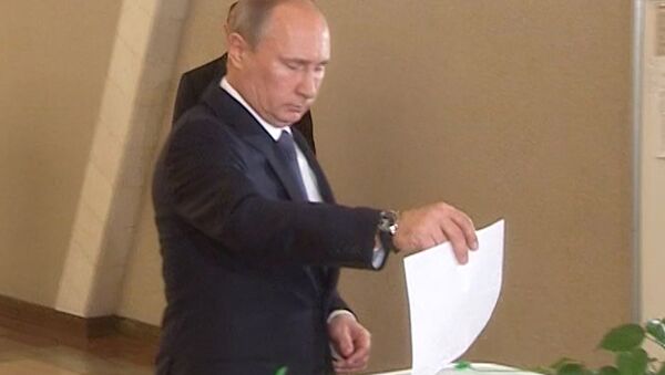 Путин опустил бюллетень в урну и рассказал, каким должен быть мэр Москвы