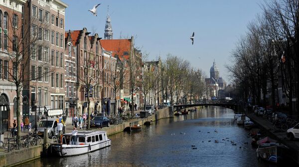 Вид на один из каналов в Амстердаме. Архивное фото