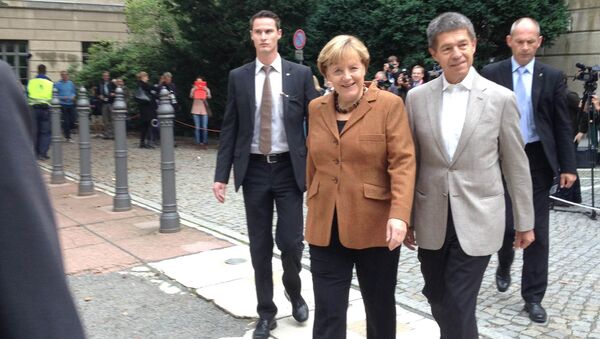 Ангела Меркель на избирательном участке на выборах в Бундестаг, фото с места события