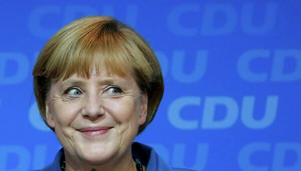 Ангела Меркель после победы коалиции ХДС/ХСС на выборах в бундестаг. Фото с места события