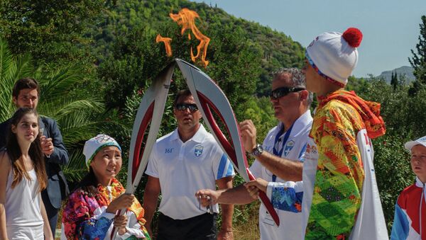 Участие якутских детей в эстафете Олимпийского огня