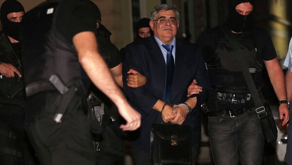 Лидер греческой ультраправой партии Золотая заря Никос Михалолиакос в суде. Фото с места событий