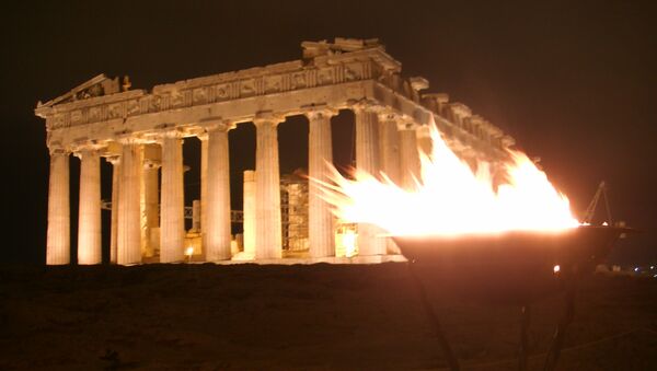 Олимпийский огонь доставили на афинский Акрополь, фото с места событий
