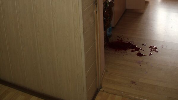 Неизвестный ранил двоих и двоих облил бензином в офисе Владивостока, архивное фото