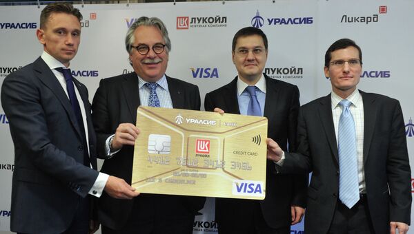 П/к банка Уралсиб, Лукойл и Visa, посвященная запуску нового совместного карточного продукта